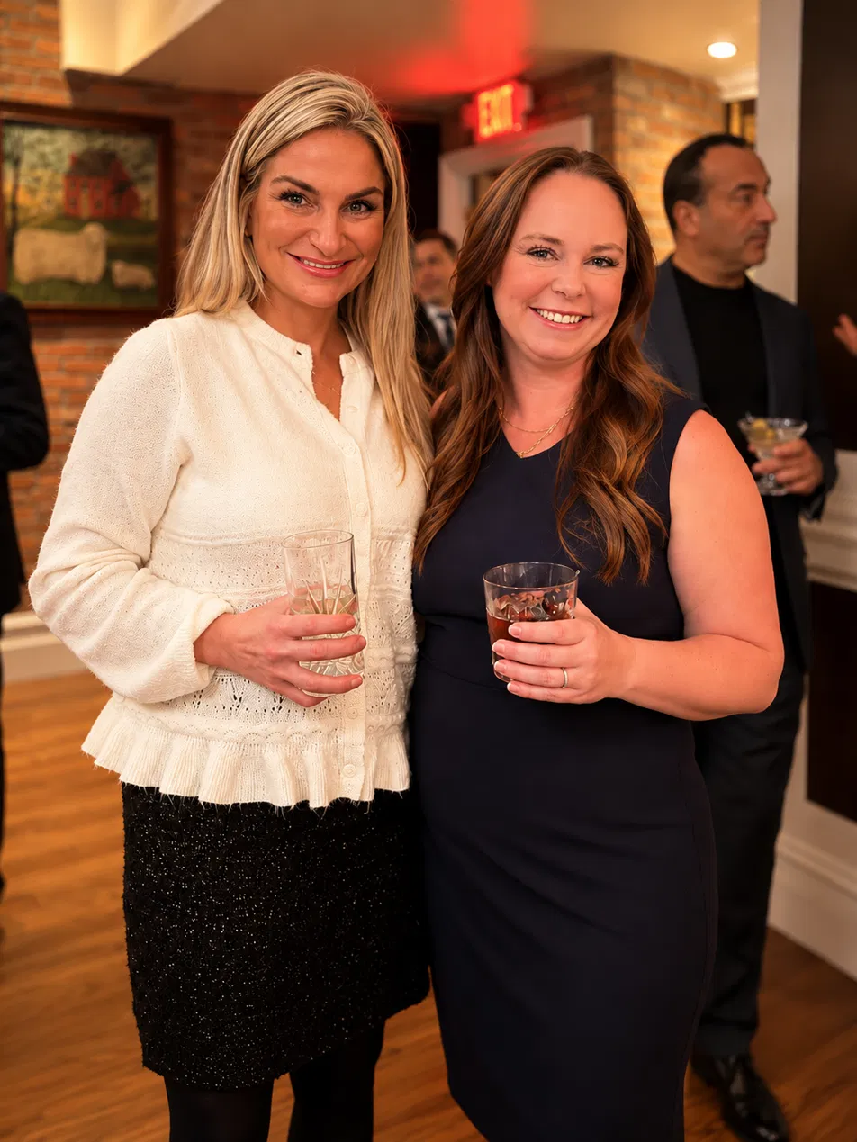 Two CORY team members connecting at an intimate industry gathering